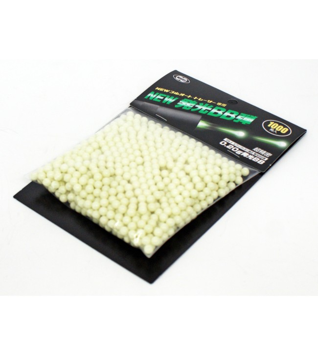 Angled product shot of Tokyo Marui 6mm luminous green tracer airsoft pellets on a white background.